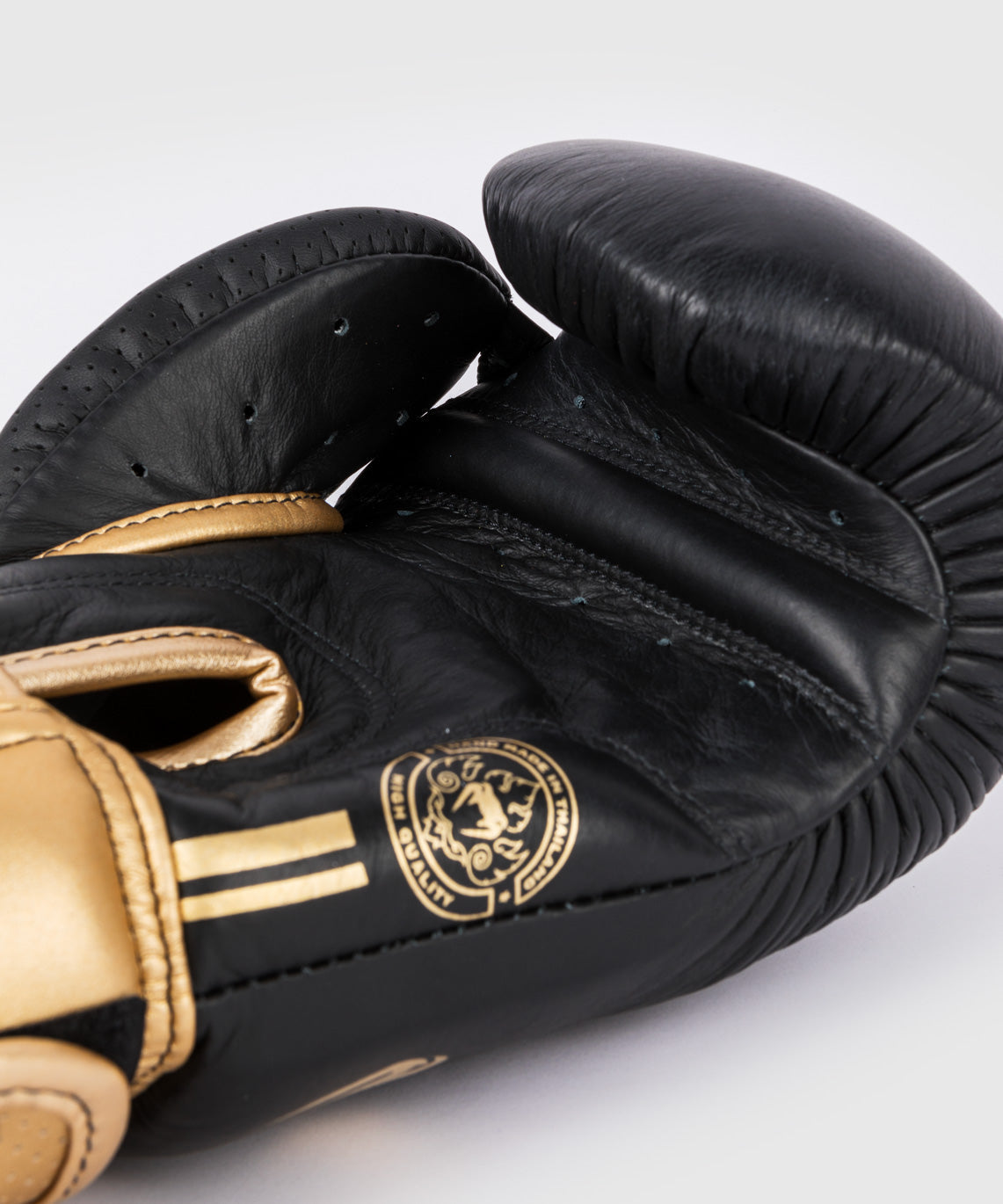 Venum boxing gloves black and gold on sale