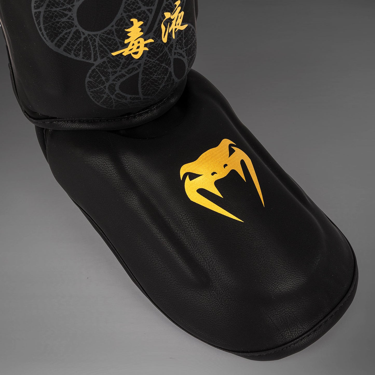 Venum Serpenti Shin Guards - Black/Silver/Gold