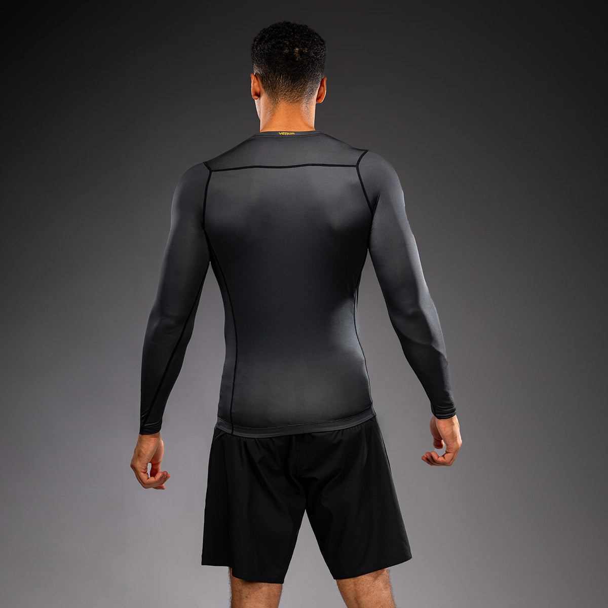 Venum Attack Long Sleeve Rashguard - Black/Gold