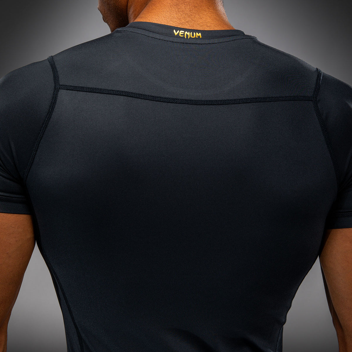 Venum Attack Short Sleeve Rashguard - Black/Gold